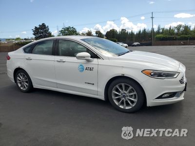 Czwarte zdjęcie samochodu z boku: 2017 FORD FUSION SE HYBRID VIN:3FA6P0LU3HR409440 - miniatura
