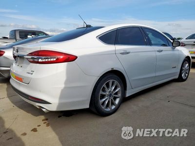 Trzecie zdjęcie samochodu z tyłu: 2017 FORD FUSION SE HYBRID VIN:3FA6P0LU9HR400726 - miniatura