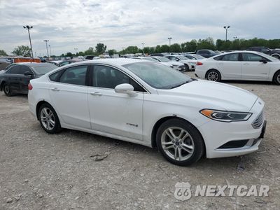 Czwarte zdjęcie samochodu z boku: 2018 FORD FUSION SE HYBRID VIN:3FA6P0LU7JR172036 - miniatura