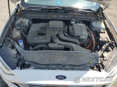 Zdjęcie 11 z 13 samochodu: 2018 FORD FUSION SE HYBRID VIN:3FA6P0LU5JR171841 - miniatura