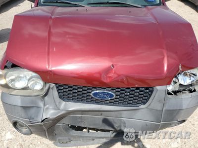 Zdjęcie 11 z 12 samochodu: 2006 FORD ESCAPE XLT VIN:1FMYU03176KA25420 - miniatura