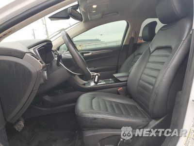 Zdjęcie 7 z 13 samochodu: 2018 FORD FUSION SE HYBRID VIN:3FA6P0LU9JR171812 - miniatura