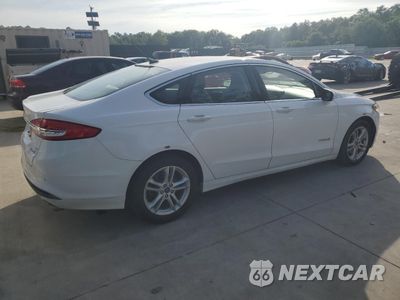 Trzecie zdjęcie samochodu z tyłu: 2018 FORD FUSION SE HYBRID VIN:3FA6P0LU1JR118831 - miniatura