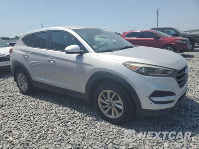 Czwarte zdjęcie samochodu z boku: 2016 HYUNDAI TUCSON SE VIN:KM8J23A43GU225772 - miniatura