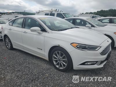 Czwarte zdjęcie samochodu z boku: 2017 FORD FUSION SE HYBRID VIN:3FA6P0LU3HR410104 - miniatura