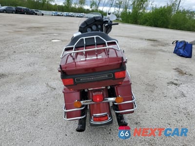 Czwarte zdjęcie samochodu z boku: 2010 HARLEY-DAVIDSON FLHTCU VIN:1HD1FC411AB666697 - miniatura