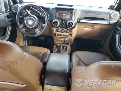 Zdjęcie 8 z 16 samochodu: 2014 JEEP WRANGLER UNLIMITED SAHARA VIN:1C4HJWEG2EL326655 - miniatura