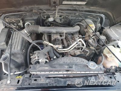 Zdjęcie 11 z 12 samochodu: 2000 JEEP WRANGLER / TJ SPORT VIN:1J4FA49S4YP754423 - miniatura