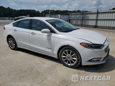 Czwarte zdjęcie samochodu z boku: 2017 FORD FUSION SE HYBRID VIN:3FA6P0LU8HR409532 - miniatura