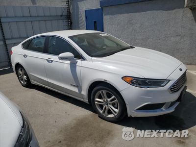 Czwarte zdjęcie samochodu z boku: 2018 FORD FUSION SE HYBRID VIN:3FA6P0LU3JR171529 - miniatura