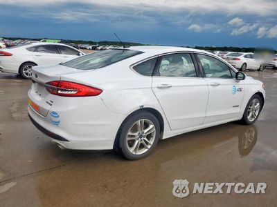 Trzecie zdjęcie samochodu z tyłu: 2018 FORD FUSION SE HYBRID VIN:3FA6P0LUXJR172063 - miniatura