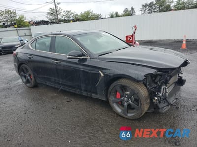 Czwarte zdjęcie samochodu z boku: 2021 GENESIS G70 PRESTIGE VIN:KMTG34LE5MU076379 - miniatura