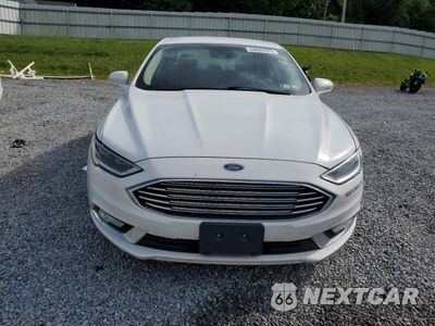 Piąte zdjęcie samochodu w środku: 2017 FORD FUSION SE HYBRID VIN:3FA6P0LU7HR359674 - miniatura