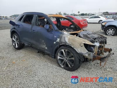 Czwarte zdjęcie samochodu z boku: 2022 AUDI Q3 VIN:WA1EECF33N1128321 - miniatura