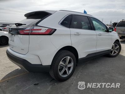 Trzecie zdjęcie samochodu z tyłu: 2024 FORD EDGE SEL VIN:2FMPK4J96RBB16419 - miniatura