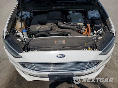 Zdjęcie 11 z 12 samochodu: 2018 FORD FUSION SE HYBRID VIN:3FA6P0LU0JR171780 - miniatura