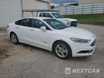 Czwarte zdjęcie samochodu z boku: 2018 FORD FUSION SE HYBRID VIN:3FA6P0LU2JR281908 - miniatura