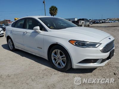 Czwarte zdjęcie samochodu z boku: 2018 FORD FUSION SE HYBRID VIN:3FA6P0LU9JR281890 - miniatura