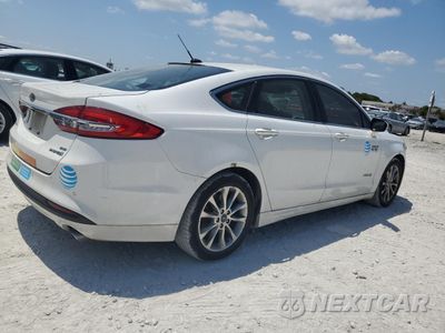 Trzecie zdjęcie samochodu z tyłu: 2017 FORD FUSION SE HYBRID VIN:3FA6P0LU0HR359631 - miniatura
