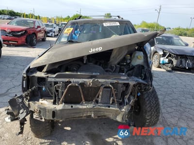 Piąte zdjęcie samochodu w środku: 1997 JEEP GRAND CHEROKEE LAREDO VIN:1J4GZ58S1VC707714 - miniatura