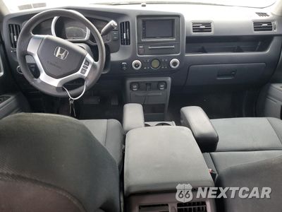 Zdjęcie 8 z 14 samochodu: 2007 HONDA RIDGELINE RTX VIN:2HJYK16387H507380 - miniatura