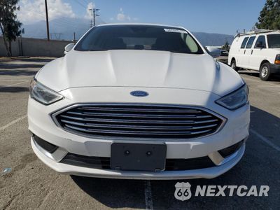 Piąte zdjęcie samochodu w środku: 2018 FORD FUSION SE HYBRID VIN:3FA6P0LU6JR171587 - miniatura