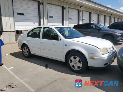 Czwarte zdjęcie samochodu z boku: 2000 VOLKSWAGEN JETTA GLS VIN:3VWSA29M3YM174433 - miniatura