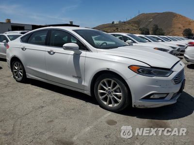 Czwarte zdjęcie samochodu z boku: 2017 FORD FUSION SE HYBRID VIN:3FA6P0LU7HR409375 - miniatura
