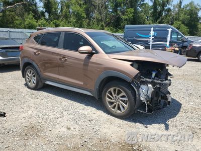 Czwarte zdjęcie samochodu z boku: 2017 HYUNDAI TUCSON LIMITED VIN:KM8J33A40HU511657 - miniatura
