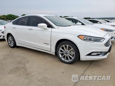 Czwarte zdjęcie samochodu z boku: 2017 FORD FUSION SE HYBRID VIN:3FA6P0LU5HR409018 - miniatura