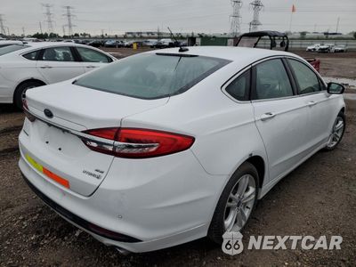 Trzecie zdjęcie samochodu z tyłu: 2018 FORD FUSION SE HYBRID VIN:3FA6P0LU9JR118740 - miniatura