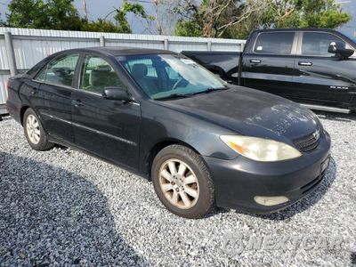 Czwarte zdjęcie samochodu z boku: 2003 TOYOTA CAMRY LE VIN:4T1BE30K43U220862 - miniatura