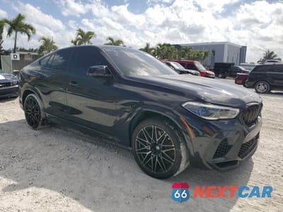 Czwarte zdjęcie samochodu z boku: 2021 BMW X6 M VIN:5YMCY0C0XN9K41642 - miniatura