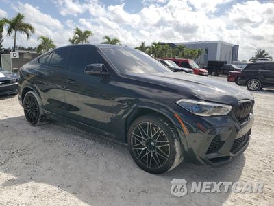 Czwarte zdjęcie samochodu z boku: 2021 BMW X6 M VIN:5YMCY0C0XN9K41642 - miniatura