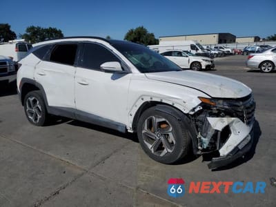 Czwarte zdjęcie samochodu z boku: 2022 HYUNDAI TUCSON LIMITED VIN:5NMJECAE3NH060931 - miniatura