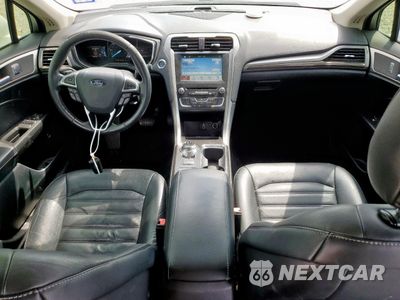 Zdjęcie 8 z 12 samochodu: 2018 FORD FUSION SE HYBRID VIN:3FA6P0LU2JR163552 - miniatura