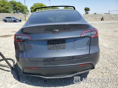 Zdjęcie 6 z 15 samochodu: 2023 TESLA MODEL Y VIN:7SAYGAEEXPF847583 - miniatura