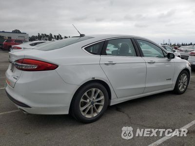 Trzecie zdjęcie samochodu z tyłu: 2018 FORD FUSION SE HYBRID VIN:3FA6P0LU3JR278726 - miniatura