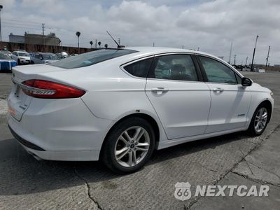 Trzecie zdjęcie samochodu z tyłu: 2018 FORD FUSION SE HYBRID VIN:3FA6P0LUXJR278643 - miniatura