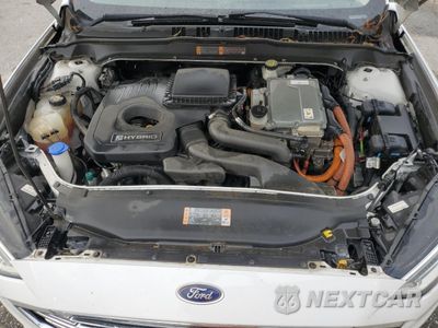 Zdjęcie 11 z 12 samochodu: 2017 FORD FUSION SE HYBRID VIN:3FA6P0LU5HR359589 - miniatura