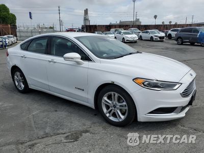 Czwarte zdjęcie samochodu z boku: 2018 FORD FUSION SE HYBRID VIN:3FA6P0LUXJR278724 - miniatura