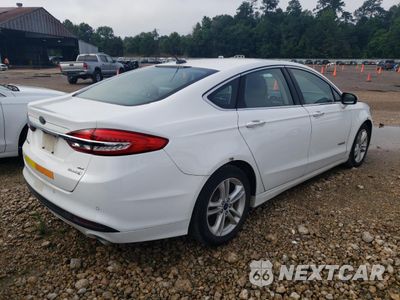 Trzecie zdjęcie samochodu z tyłu: 2018 FORD FUSION SE HYBRID VIN:3FA6P0LU6JR118629 - miniatura