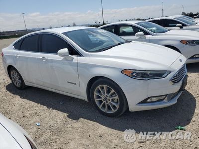 Czwarte zdjęcie samochodu z boku: 2017 FORD FUSION SE HYBRID VIN:3FA6P0LU5HR409164 - miniatura