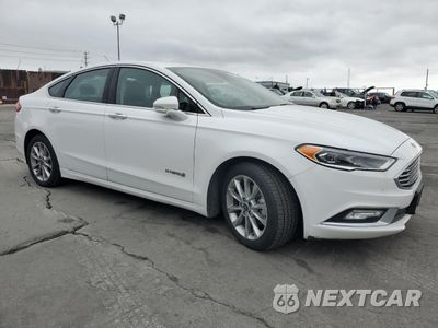 Czwarte zdjęcie samochodu z boku: 2017 FORD FUSION SE HYBRID VIN:3FA6P0LU9HR409765 - miniatura