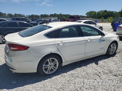 Trzecie zdjęcie samochodu z tyłu: 2018 FORD FUSION SE HYBRID VIN:3FA6P0LU7JR178466 - miniatura