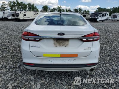 Zdjęcie 6 z 12 samochodu: 2018 FORD FUSION SE HYBRID VIN:3FA6P0LU3JR171773 - miniatura
