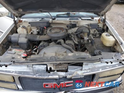 Zdjęcie 11 z 12 samochodu: 1993 GMC SIERRA K1500 VIN:1GTEK14K1PZ532221 - miniatura