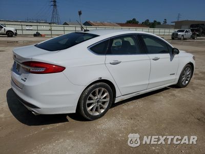 Trzecie zdjęcie samochodu z tyłu: 2017 FORD FUSION SE HYBRID VIN:3FA6P0LUXHR409130 - miniatura