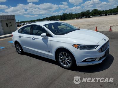 Czwarte zdjęcie samochodu z boku: 2017 FORD FUSION SE HYBRID VIN:3FA6P0LU8HR409255 - miniatura