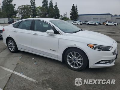 Czwarte zdjęcie samochodu z boku: 2017 FORD FUSION SE HYBRID VIN:3FA6P0LU6HR409755 - miniatura